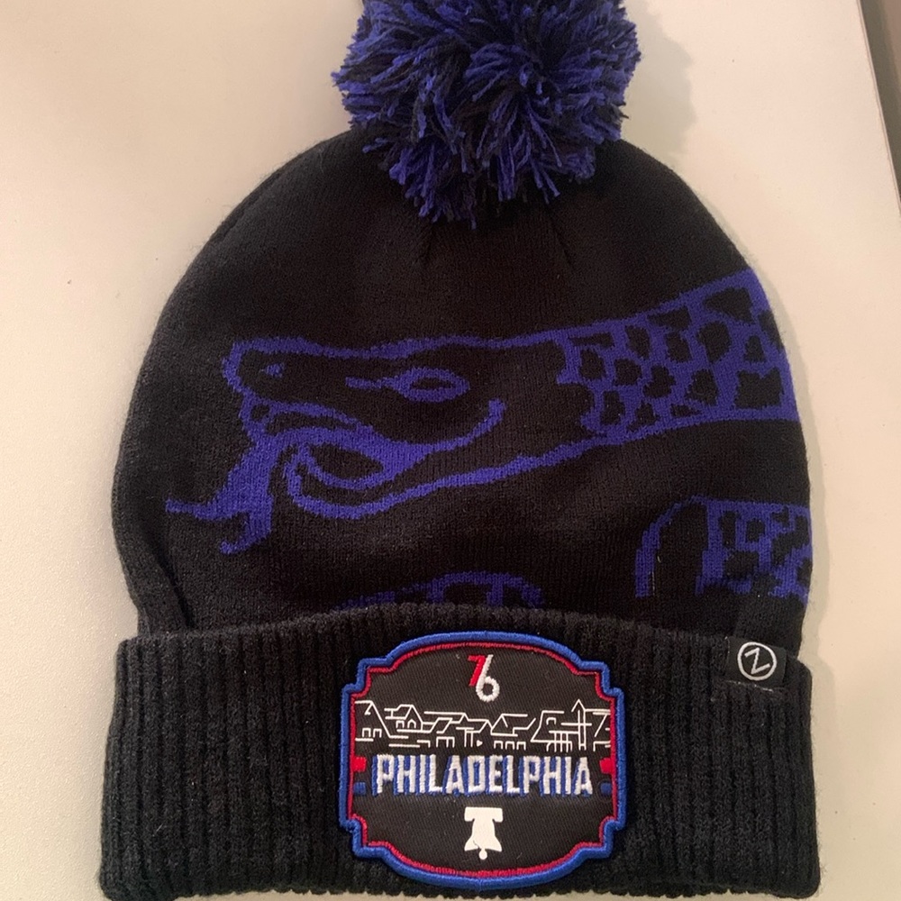 Philadelphia 76ers pom-pom beanie hat.